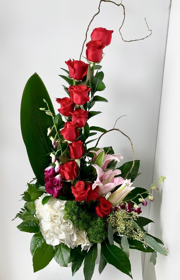GLW136 - SPIRAL ROSES, LILLIES, HYDRANGEAS, DENDROBIUM ORCHIDS AND GREENERY WITH EUCALYPTUS